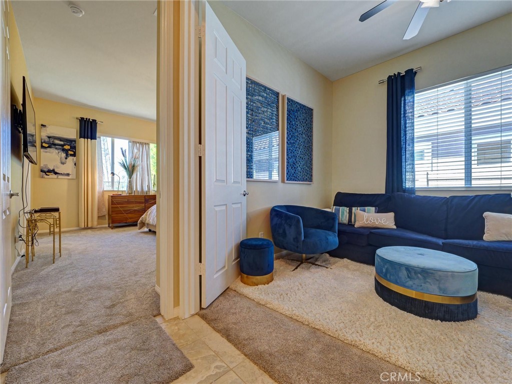 887 Westchester Road Beaumont, CA 92223 - Photo 36 of 41 a living room with furniture and a large window