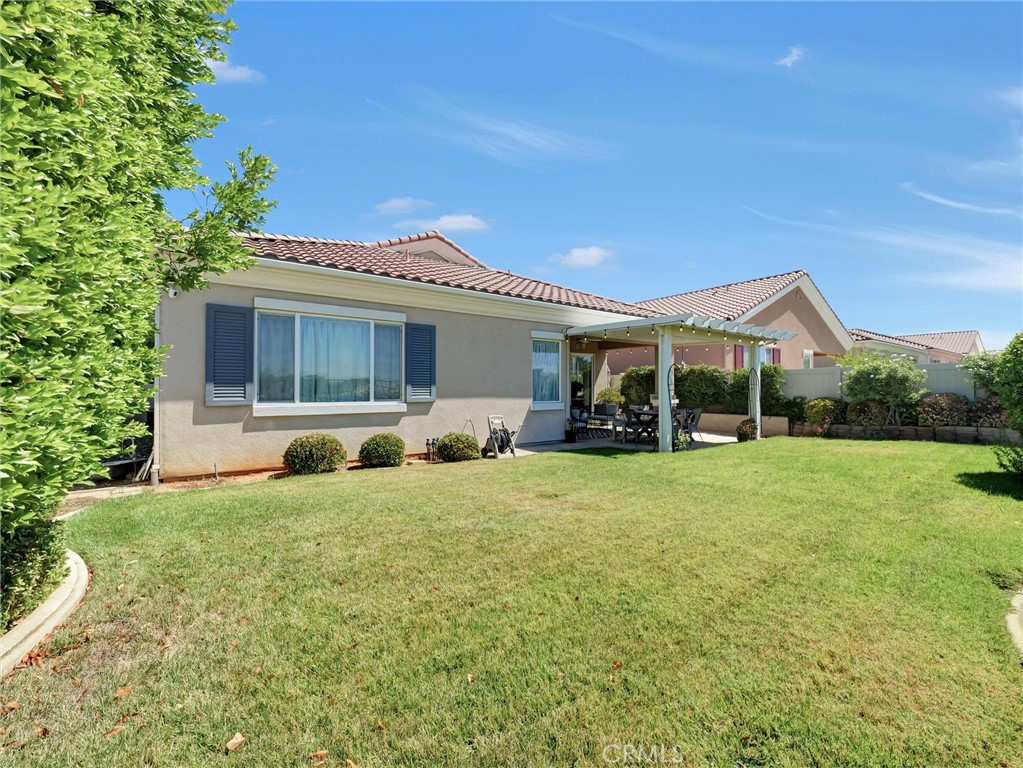 887 Westchester Road Beaumont, CA 92223 - Photo 40 of 41 a front view of a house with garden