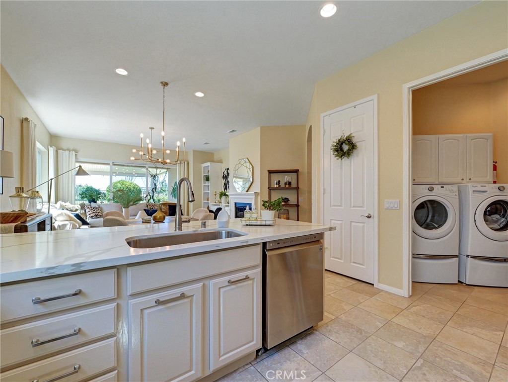 887 Westchester Road Beaumont, CA 92223 - Photo 9 of 41 a kitchen with sink and cabinets