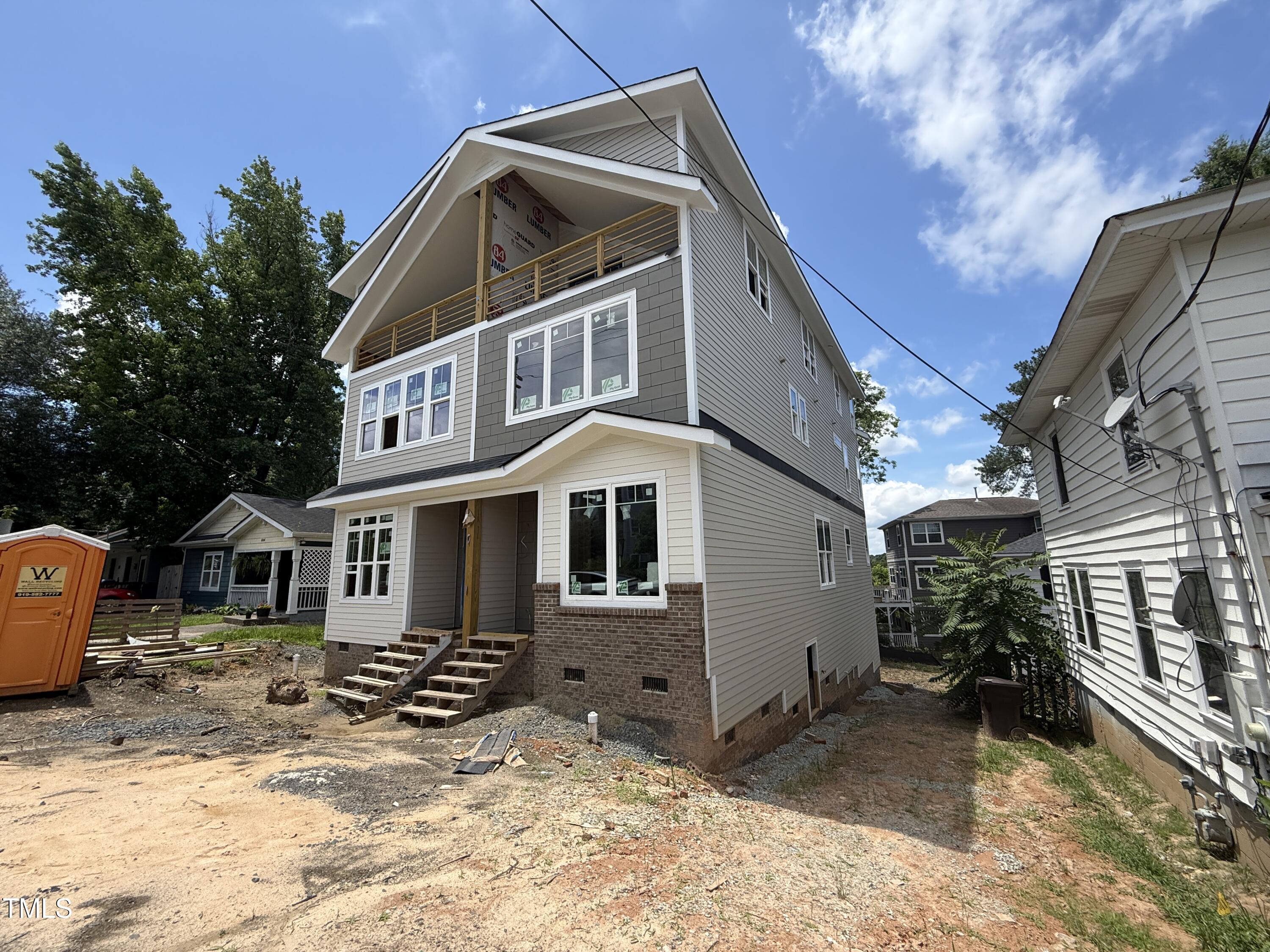 804 South Roxboro Street Durham, NC 27707 - Photo 3 of 15 a front view of a house with a yard