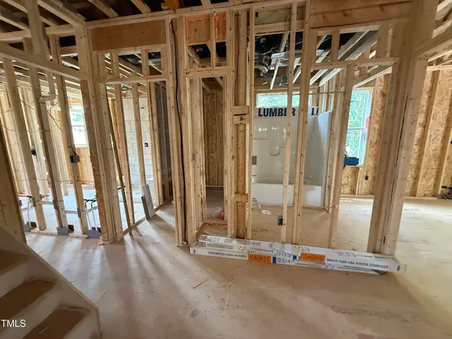 a view of a door with wooden walls