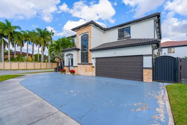 a house view with a garden space