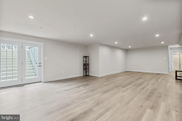 a bedroom with a bed and a closet