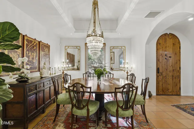 a view of a dining room with furniture and window
