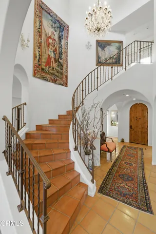 a view of entryway livingroom and hall