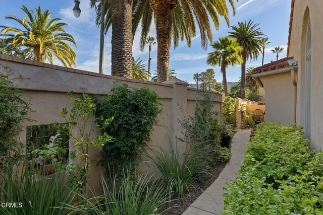 a view of a house with a street
