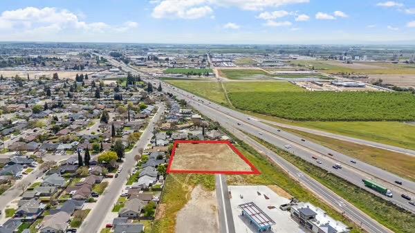 2450 Fulkerth Road Turlock, CA 95380 - Photo 9 of 16 an aerial view of residential houses with outdoor space