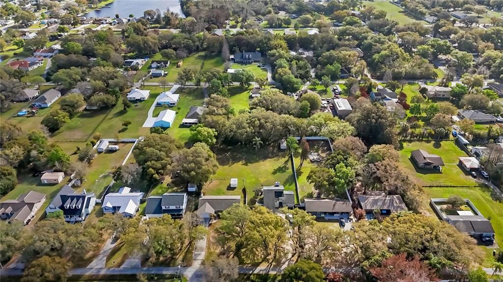 0 Grape Avenue St. Cloud, FL 34769 - Photo 11 of 52 an aerial view of a houses with a yard