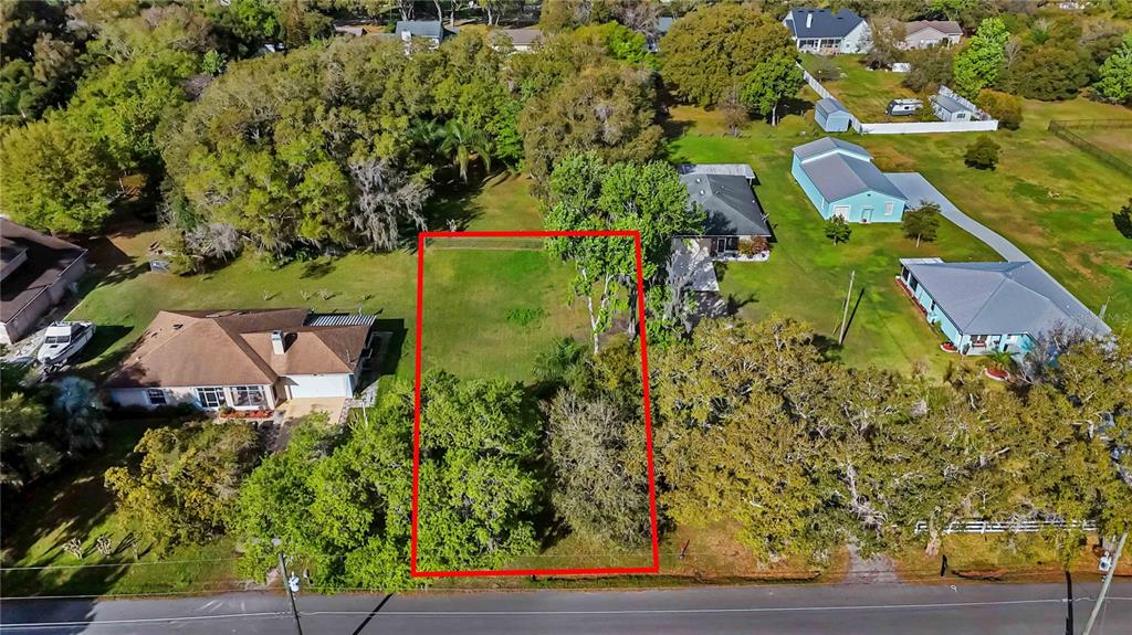 0 Grape Avenue St. Cloud, FL 34769 - Photo 2 of 52 an aerial view of a house with yard swimming pool and outdoor seating