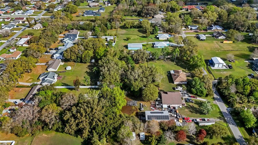 0 Grape Avenue St. Cloud, FL 34769 - Photo 23 of 52 an aerial view of residential houses with outdoor space