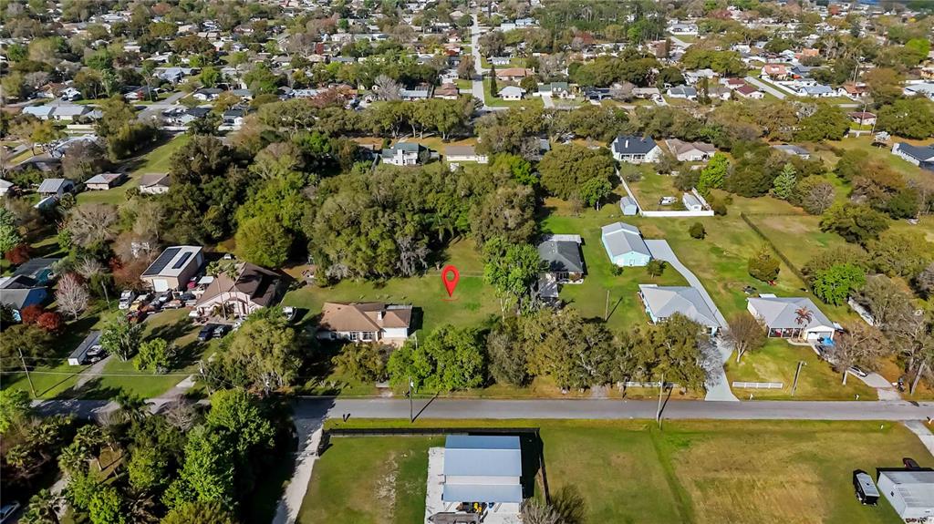 0 Grape Avenue St. Cloud, FL 34769 - Photo 6 of 52 an aerial view of residential houses with outdoor space