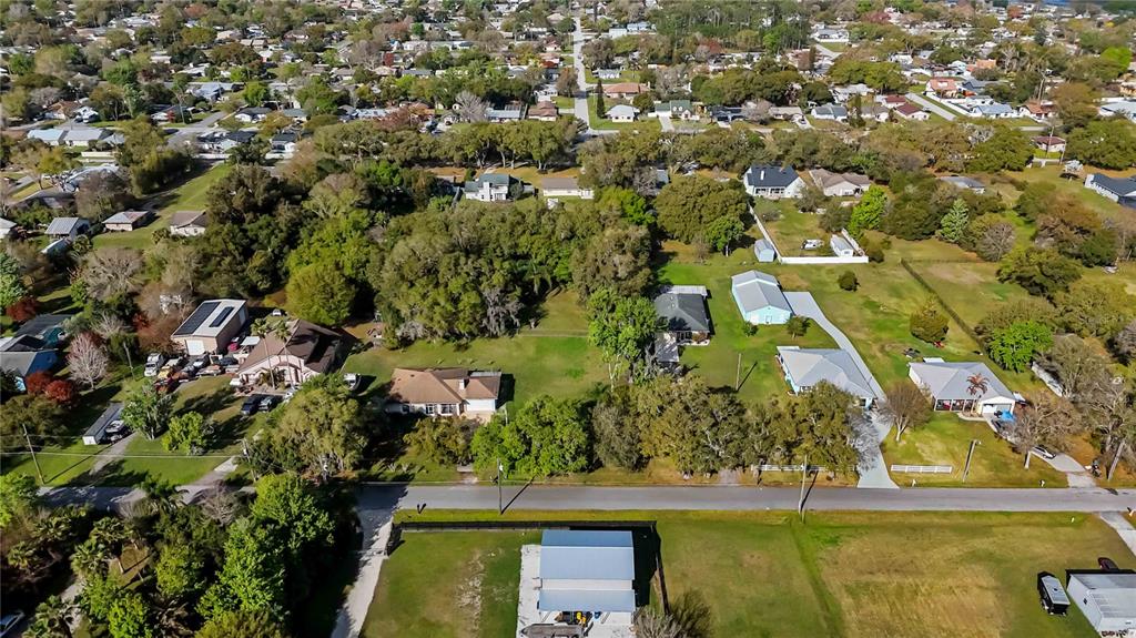 0 Grape Avenue St. Cloud, FL 34769 - Photo 7 of 52 an aerial view of residential houses with outdoor space