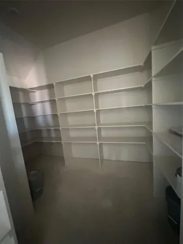 a view of a room with shelves