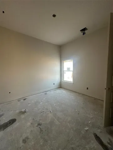 a view of empty room with windows