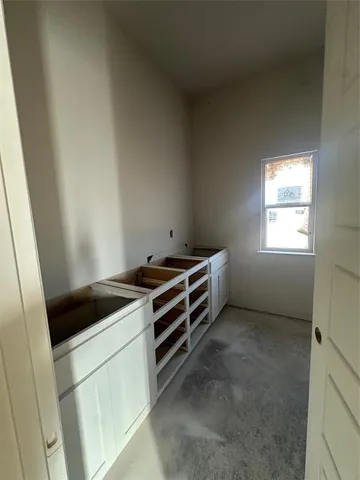 a storage room with washer and dryer