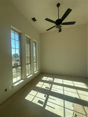 a view of an empty room and window