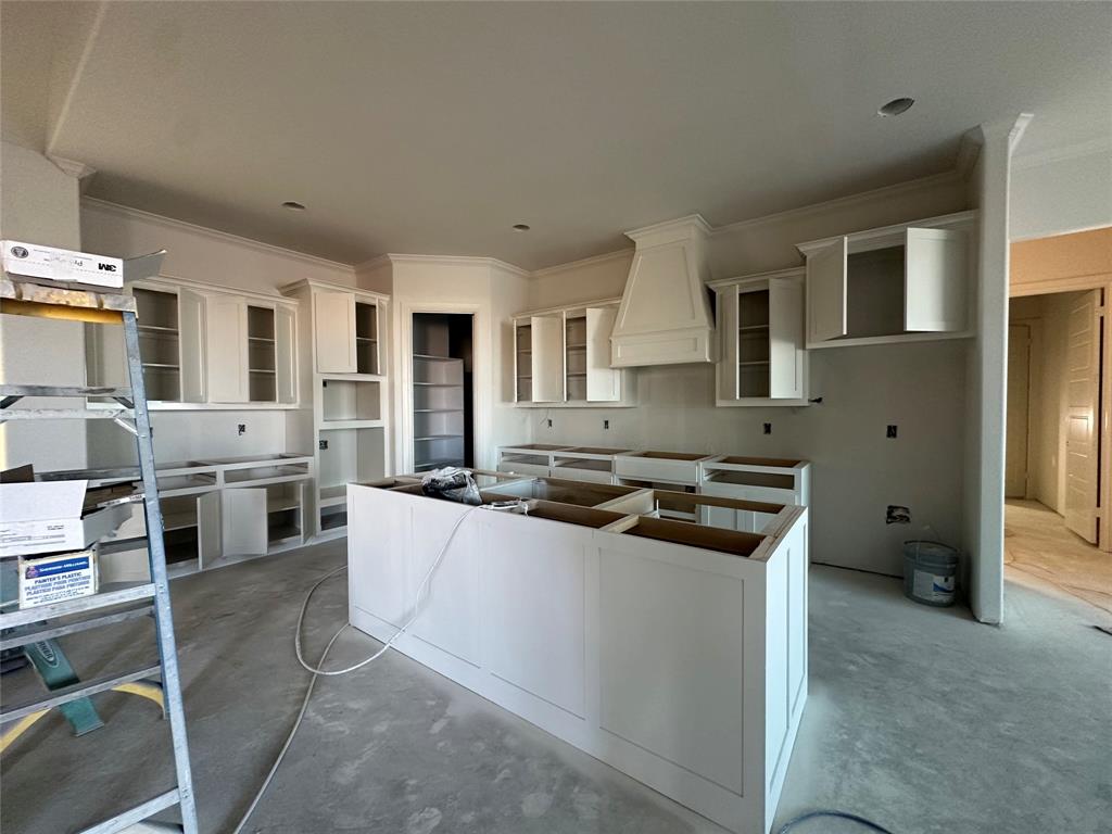 2220 Cr 4371 Decatur Tx 76234 Decatur, TX 76234 - Photo 5 of 16 a kitchen with stainless steel appliances granite countertop a stove top oven a sink a counter space and cabinets