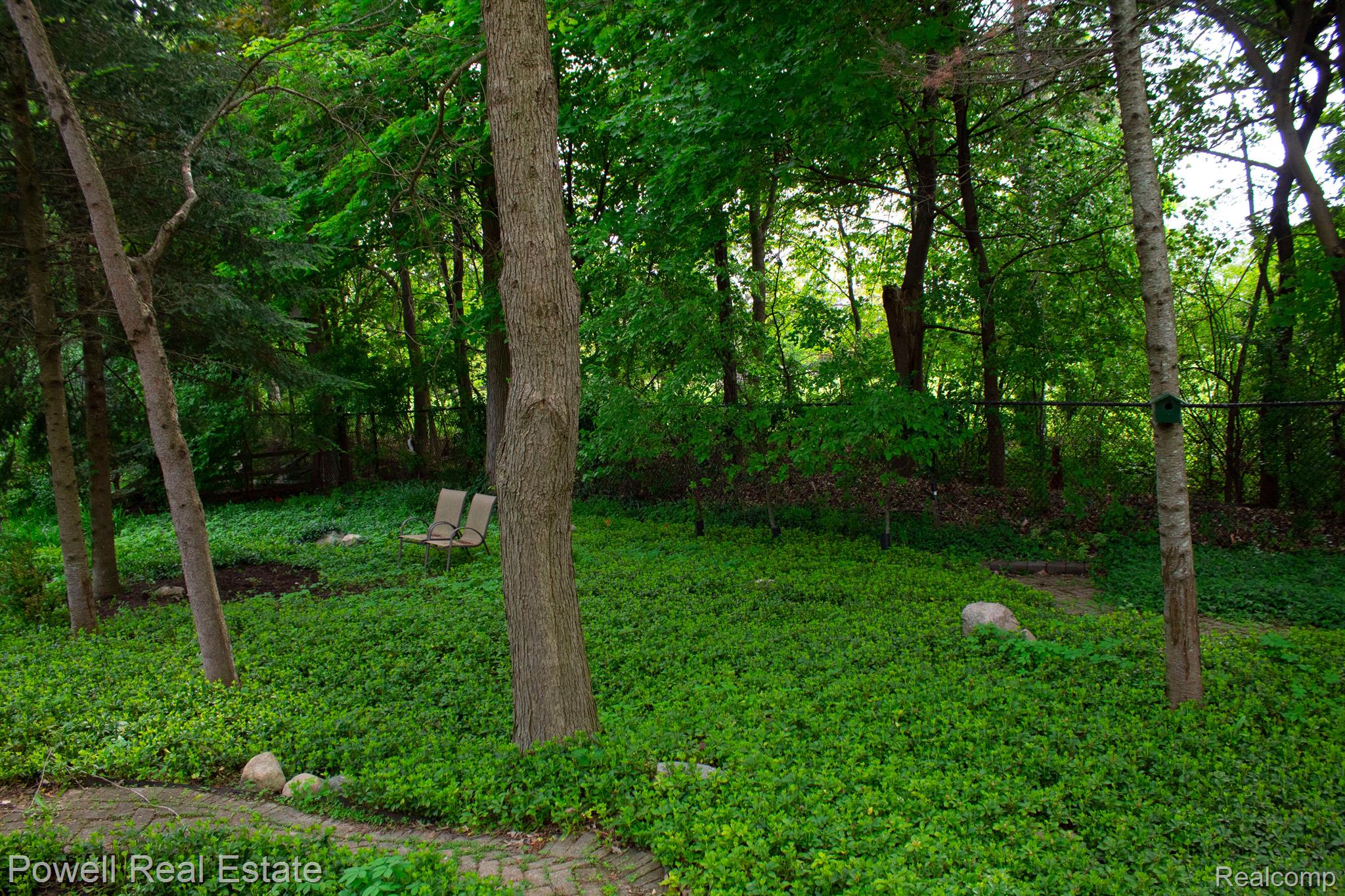 20027 Wayne Road Livonia, MI 48152 - Photo 38 of 40 Park-like backyard facing a park with trails