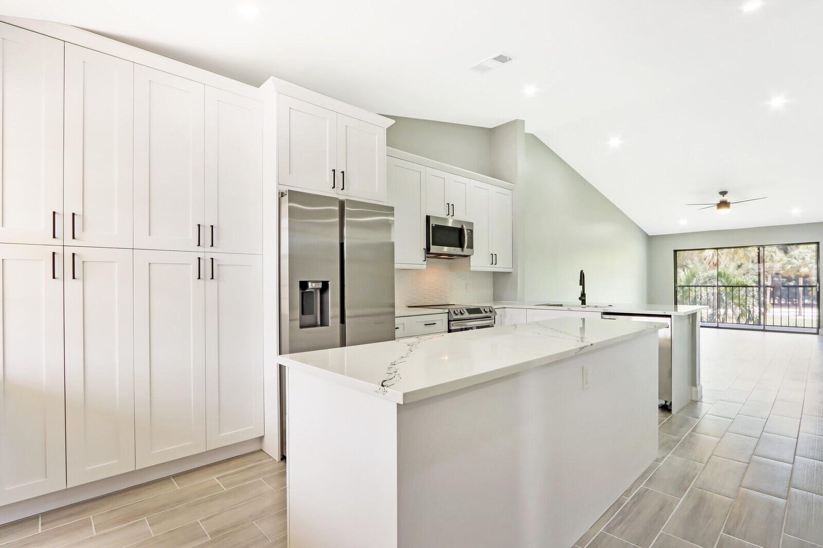 1122 Keystone Drive, Unit F Jupiter, FL 33458 - Photo 5 of 9 Kitchen/ Living
