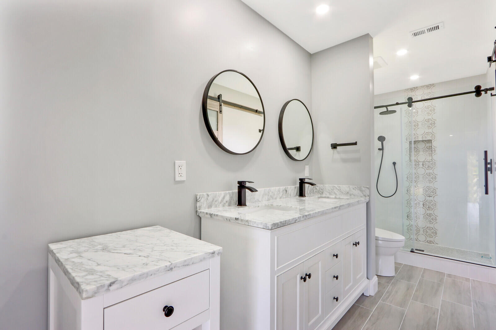 1122 Keystone Drive, Unit F Jupiter, FL 33458 - Photo 8 of 9 Master bathroom Dual Sinks