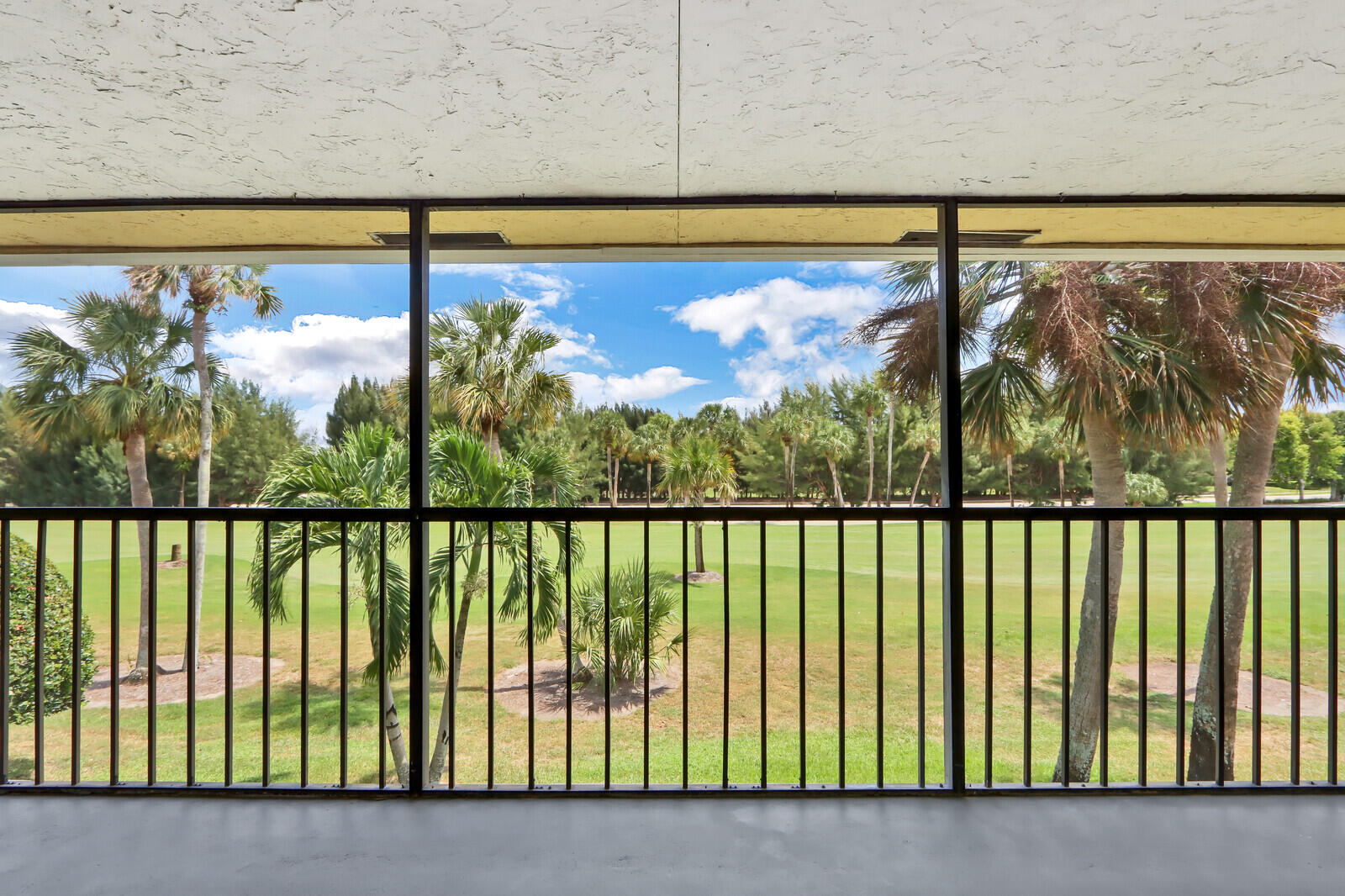 1122 Keystone Drive, Unit F Jupiter, FL 33458 - Photo 9 of 9 Golf Views from Screened Balcony