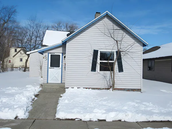 a view of a house with a garage