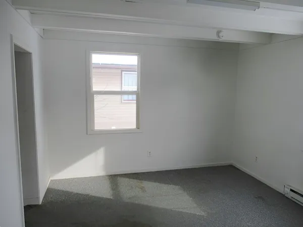 an empty room with a window