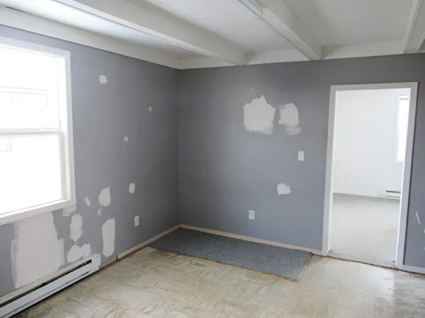 an empty room with windows