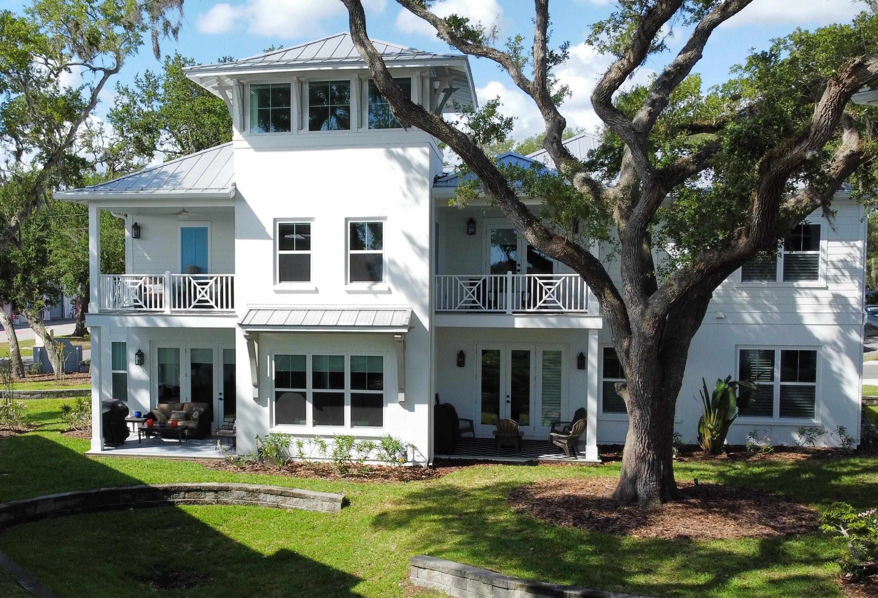 front view of a house with a yard