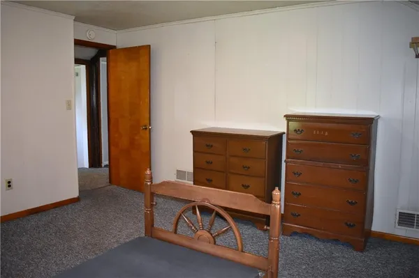 a view of walk in closet with furniture