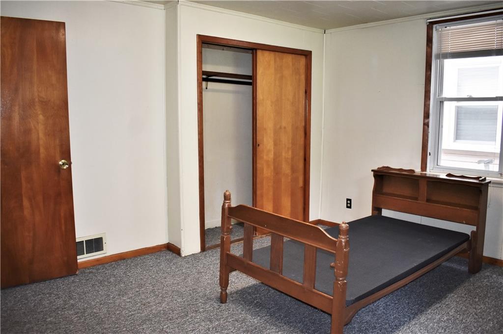1029 School Street Indiana, PA 15701 - Photo 9 of 23 a room with a bed and a window