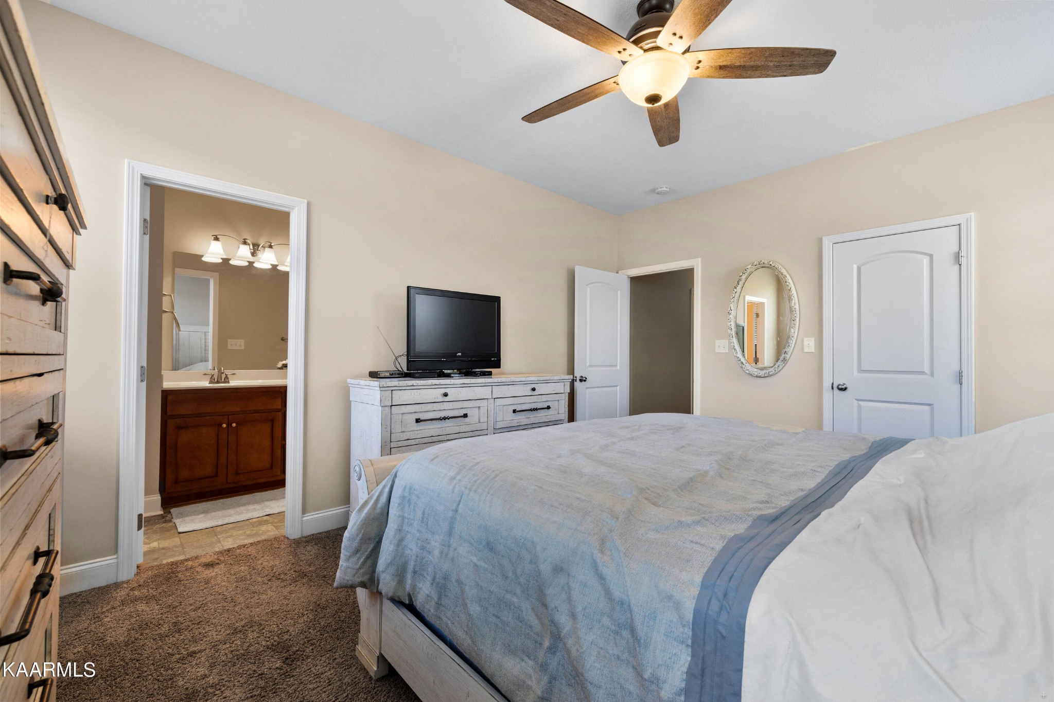 820 Kodak Road Kodak, TN 37764 - Photo 15 of 45 a bedroom with a bed and a flat screen tv
