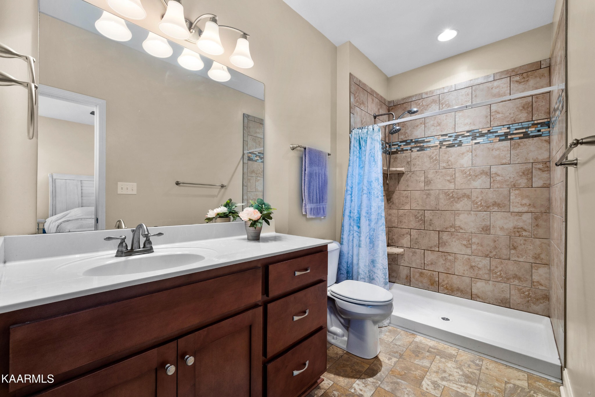 820 Kodak Road Kodak, TN 37764 - Photo 17 of 45 a bathroom with a sink a toilet and shower