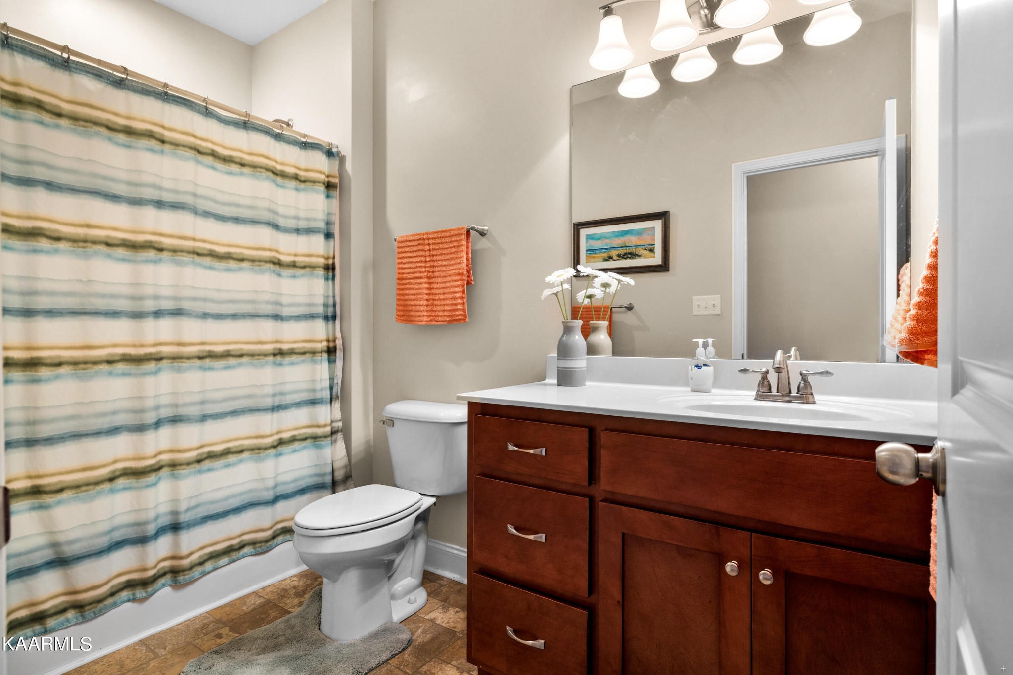 820 Kodak Road Kodak, TN 37764 - Photo 19 of 45 a bathroom with a toilet sink and mirror