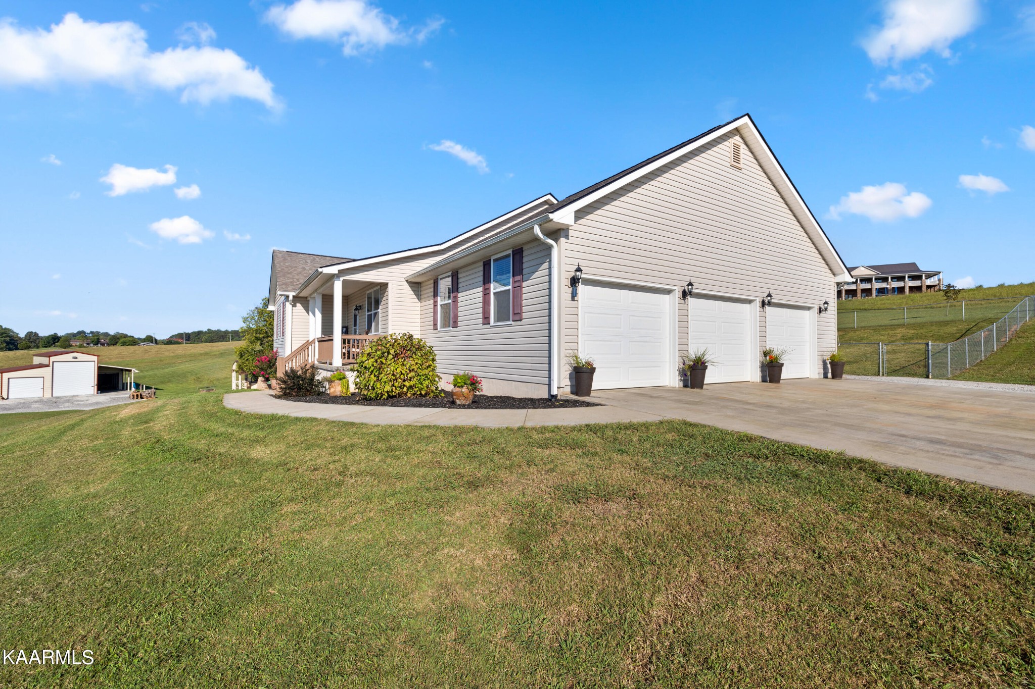 820 Kodak Road Kodak, TN 37764 - Photo 2 of 45 a view of a house with backyard and sitting area