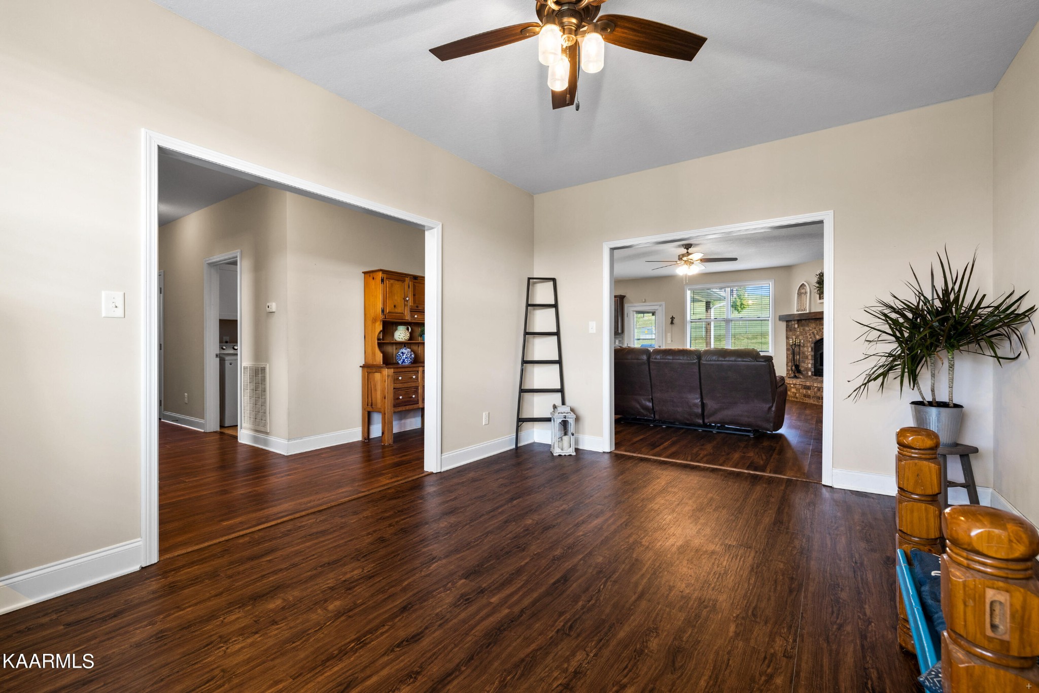 820 Kodak Road Kodak, TN 37764 - Photo 8 of 45 a view of livingroom with hardwood floor and a ceiling fan