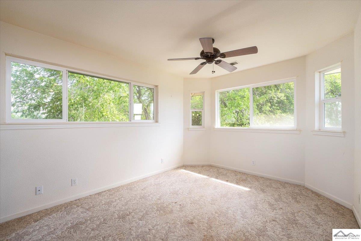 19950 Red Bank Road Red Bluff, CA 96080 - Photo 38 of 69 a view of room with a ceiling fan and window