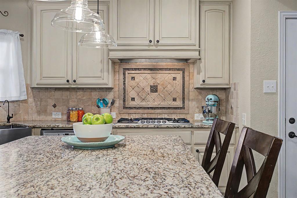 203 Saddle Ridge Court Springtown, TX 76082 - Photo 14 of 39 And the gas cooktop? Cherry on top! Reverse osmosis at the sink, too!
