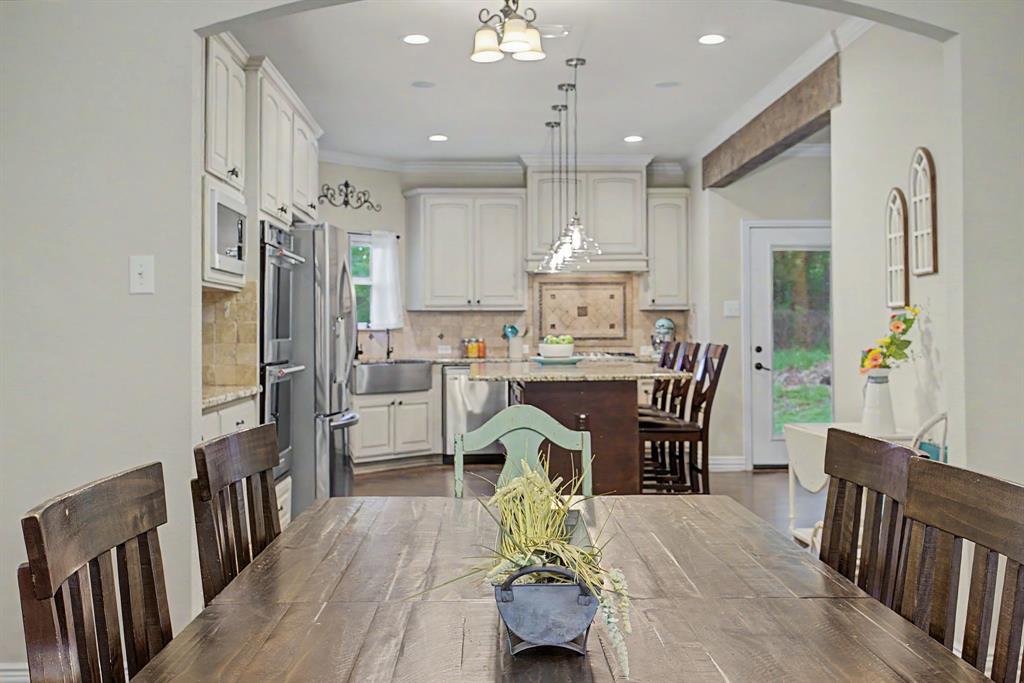 203 Saddle Ridge Court Springtown, TX 76082 - Photo 18 of 39 And it connects so easily to the kitchen. Great flow in this home.