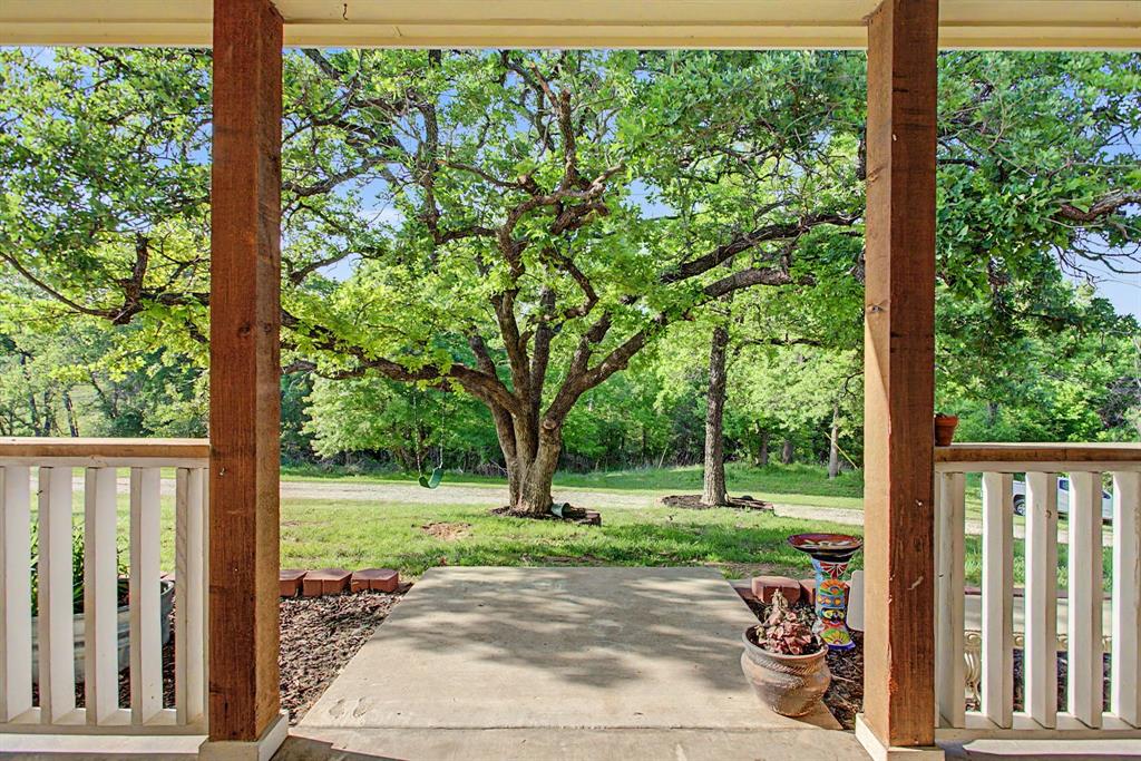 203 Saddle Ridge Court Springtown, TX 76082 - Photo 4 of 39 Front porch views don't get much better than this.
