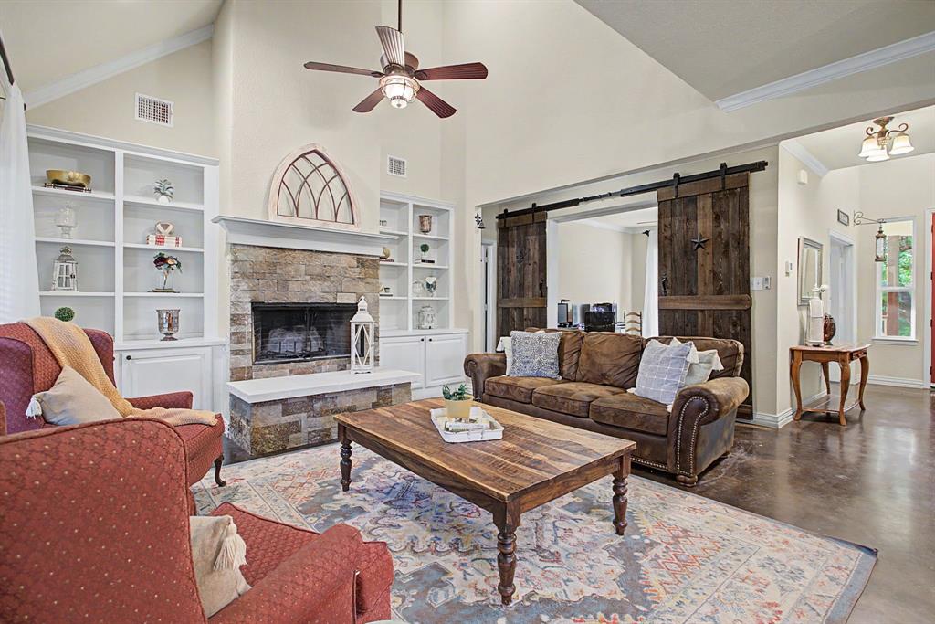 203 Saddle Ridge Court Springtown, TX 76082 - Photo 8 of 39 Yes those are hand made custom barn doors to the office. You're welcome.