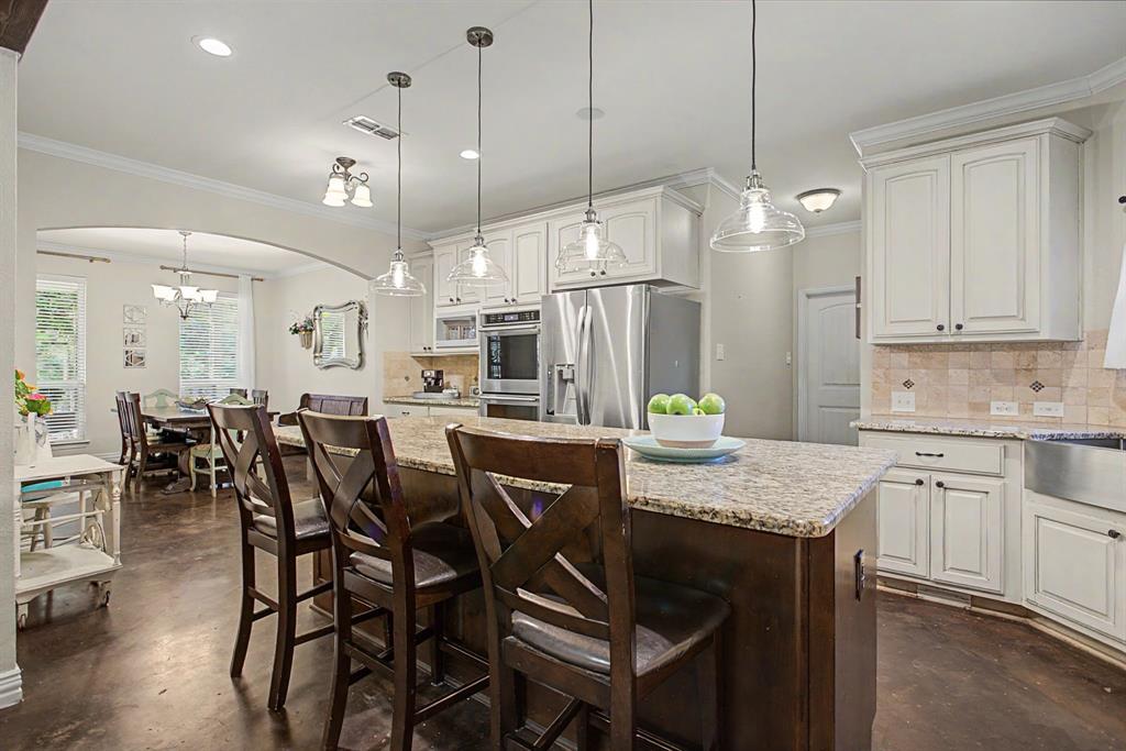 203 Saddle Ridge Court Springtown, TX 76082 - Photo 10 of 39 This kitchen checks off every single box - starting with the giant island!