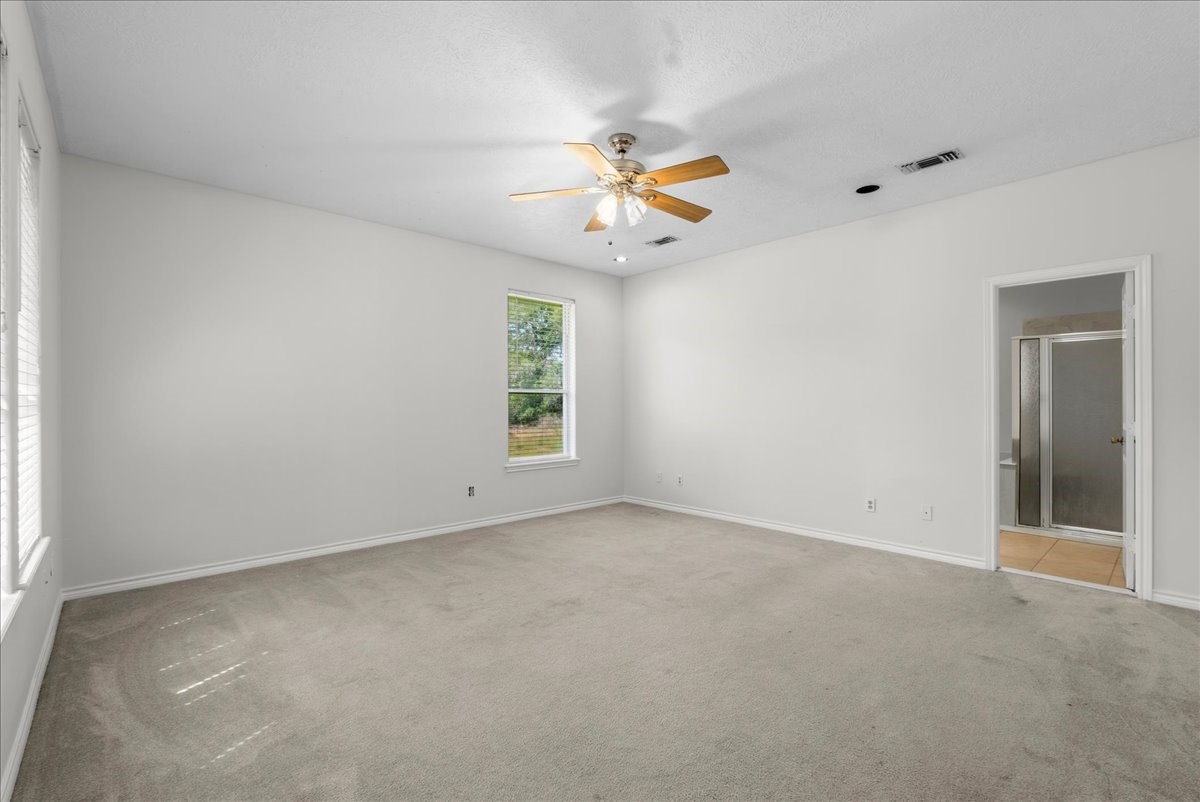 1607 Delta Lane Baytown, TX 77523 - Photo 21 of 48 The large primary bedroom