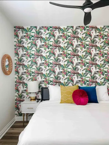 a bathroom with a bathtub and mirror