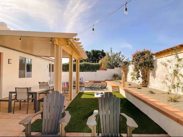 a view of a living room and kitchen