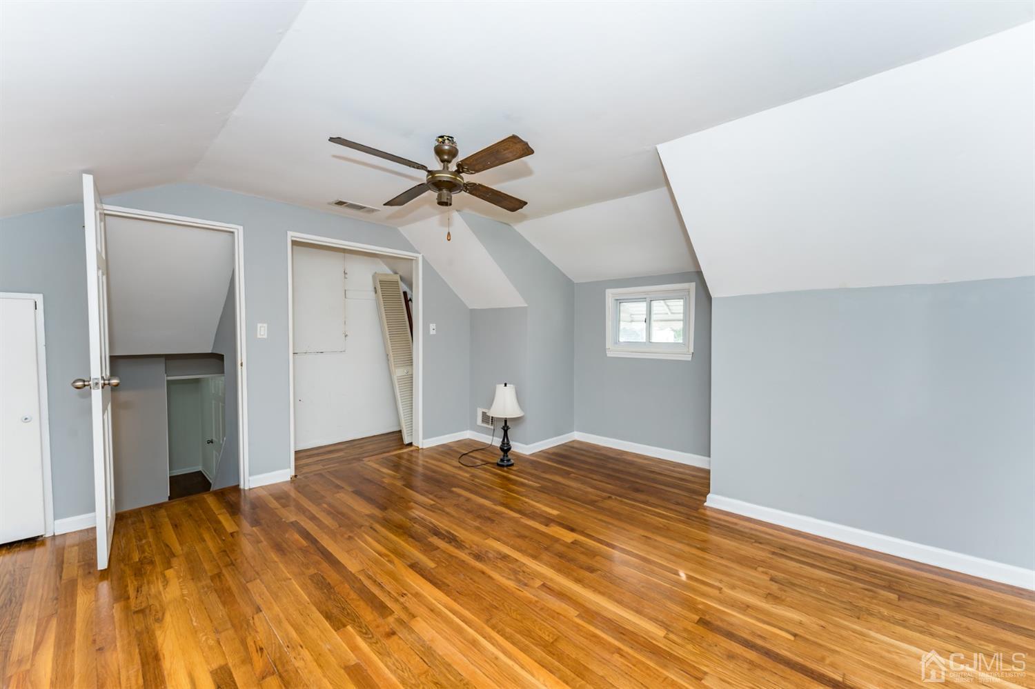 186 McFarlane Road Colonia, NJ 07067 - Photo 8 of 22 a bedroom with a bed and a window