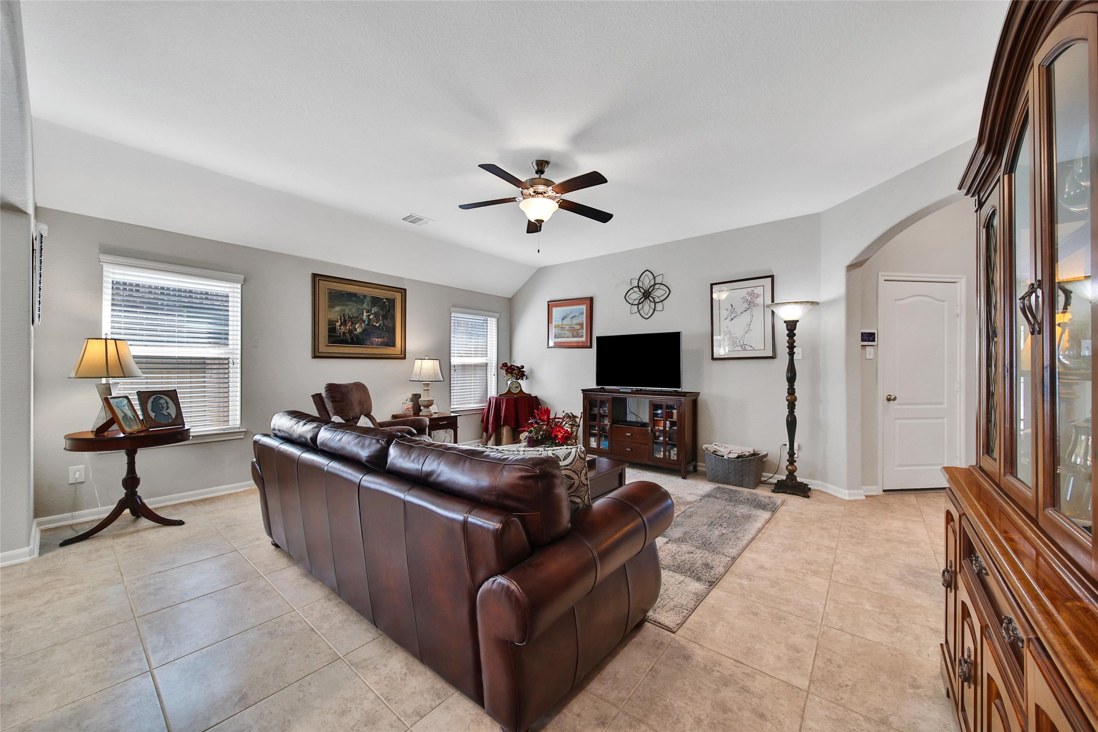 214 Pleasant Hill Way Conroe, TX 77304 - Photo 12 of 43 Two windows and high ceilings keep this space feeling light, bright, and open.