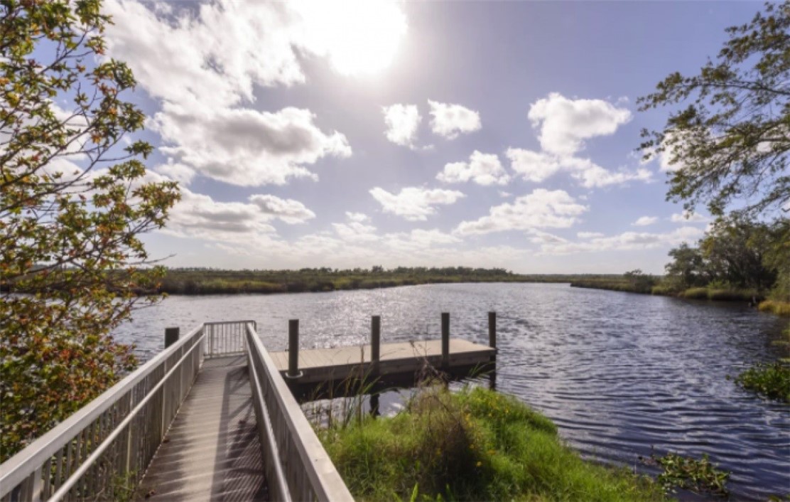 75020 Edwards Road Yulee, FL 32097 - Photo 2 of 6 a view of a lake from a balcony