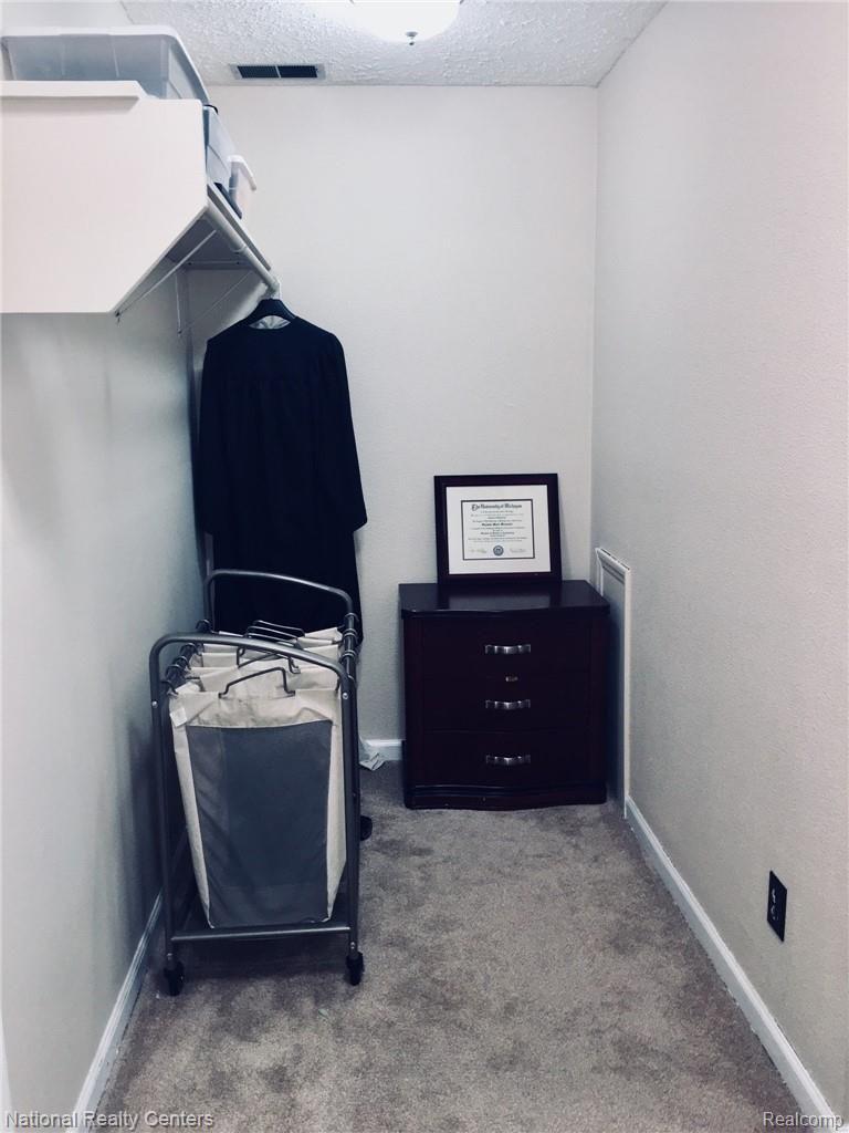 2922 North Lake George Road Dryden, MI 48428 - Photo 40 of 64 Huge bonus/closet space (MORE), between Master Bedroom & Master Bath. Allows for Privacy, & perhaps a place to put those clothes you can wear again...
