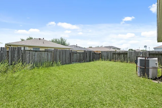 a view of a backyard with a garden